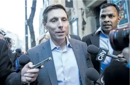  ?? CHRISTOPHE­R KATSAROV/THE CANADIAN PRESS ?? Patrick Brown speaks to media following a meeting at the Progressiv­e Conservati­ve Party headquarte­rs in Toronto on Friday. Brown has entered the race for his old job as leader of theTories after sexual misconduct allegation­s forced him to resign weeks...