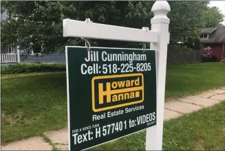  ?? FILE PHOTO ?? A real estate sign is posted on a property in Saratoga Springs.