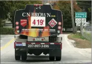  ?? AP PHOTO/ROBERT F. BUKATY ?? A fuel delivery truck advertises its price for a gallon of heating oil Oct. 5 in Livermore Falls, Maine.