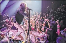  ?? Kat Benzova ?? Steven Tyler of Aerosmith is shown performing on the bar in the onstage VIP section at Park Theater on Tuesday. A single VIP ticket is about $295, but you get a lot of bang for the buck, Kats says.
