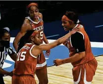  ?? Billy Calzada / Staff photograph­er ?? On a rough night for Texas star Charli Collier, middle, Kyra Lambert and Lauren Ebo stepped up against UCLA.