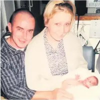  ??  ?? Tiny treasure Mum Michelle, dad Robert and Morgan in hospital