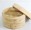  ??  ?? A bamboo steamer with multiple stacks let you cook several elements of a meal in one pot.