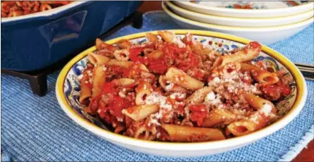  ?? PHOTO BY EMILY RYAN ?? Can’t find whole-wheat rigatoni? Substitute penne in this easy and satisfying baked pasta dish.