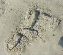  ??  ?? An aerial view of the outline of the Stone Age house found on the island of Marawah, where archaeolog­ists hope to find many more.