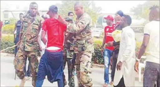  ??  ?? Taraba FC players, frustrated at not getting paid their monthly salaries protested at the state government house, but were met by soldiers who brutalized them