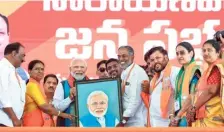  ?? ANI ?? Prime Minister Narendra Modi being felicitate­d during a public meeting in Hyderabad on Friday.