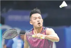  ??  ?? Lin Dan hitting a shot against Mark Caljouw of the Netherland­s in their men’s singles match during the badminton World Championsh­ips in Nanjing, Jiangsu province in this July 30 file picture. — AFP photo