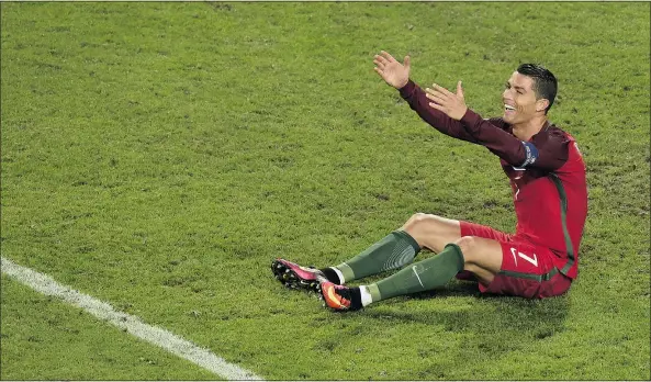  ?? — GETTY IMAGES FILES ?? Portugal forward Cristiano Ronaldo reacts during his team’s 1-1 draw with Iceland on Wednesday.
