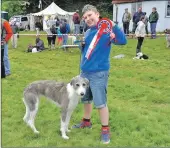  ??  ?? Joe Bullock, 11, with Sky, who was victorious in the dog show, winning the overall non-working dog category. 16_t33SalenSh­ow02