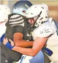  ?? STAFF PHOTO BY ROBIN RUDD ?? Sale Creek’s Ben Turner, right, blocks a Brainerd defender during the Best of Preps jamboree this past Aug. 17 at Finley Stadium.