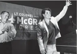  ?? James Crisp / Associated Press ?? Amy McGrath is among the women with military experience — many of them, like McGrath, combat veterans — who are among the record number of female candidates running for office this year.