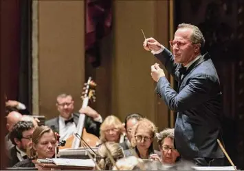  ?? Photo coutesy of Gary Gold ?? Albany Symphony director David Alan Miller conducting the orchestra.