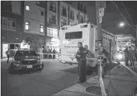  ?? CP PHOTO ?? Police are seen securing a perimeter around a scene of mass casualty event in Toronto on Sunday, July 22.