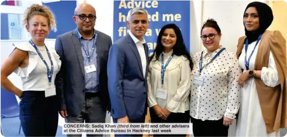  ?? ?? CONCERNS: Sadiq Khan (third from left) and other advisers at the Citizens Advice Bureau in Hackney last week