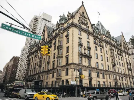  ?? ANDREW BURTON/GETTY IMAGES ?? John Lennon, Yoko Ono, Judy Garland, Leonard Bernstein, Boris Karloff, Paul Simon and Lauren Bacall are among the celebritie­s associated with New York City’s famed Dakota apartment building, which is the setting for the new novel The Dakota Winters.