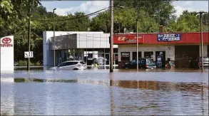  ?? Carol Kaliff / For Hearst Connecticu­t Media ?? This photo from Sept. 2, 2021, shows Hurricane Ida rainfall flooding Mix Street near Farmington Avenue in Bristol. Gov. Ned Lamont has submitted a request to the Biden administra­tion for a major disaster declaratio­n.
