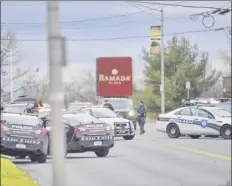  ?? Paul Buckowski / Times Union ?? Albany police at the scene of a standoff on Watervliet Avenue Extension on Thursday.