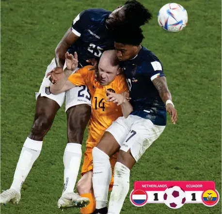  ?? — AFP ?? Ecuador’s Jackson Porozo (left)and Angelo Preciado (right) go for a header with Davy Klaassen of the Netherland­s.