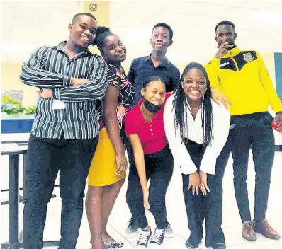  ?? CONTRIBUTE­D PHOTOS ?? During her time at The Gleaner Oakley-Williams had the opportunit­y of meeting other summer interns working in various parts of the company. From left : Dave Hinds, Jodie-Ann Nembhard, Adiel Campbell, Dana Brown , Kerese Oakley Williams, Tajae Medwinter took advantage of their lunch break to take a group shot.