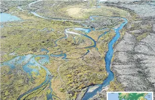  ?? IMAGES: USEPA/MAPSFORFRE­E ?? Productive ecosystem . . . The braided wetlands and tundra typical of the Bristol Bay watershed. Upper Talarik Creek, shown here, flows into Lake Iliamna and then the Kvichak River, before emptying into the bay (inset) at its northeaste­rnmost point. The mine location is north of the lake.