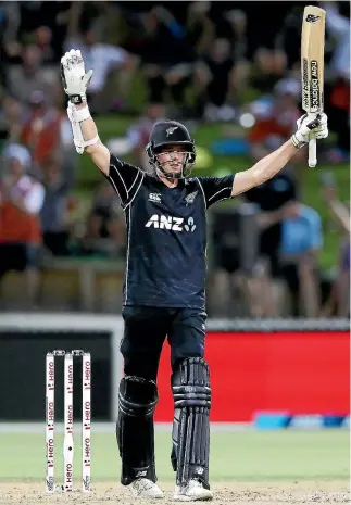  ?? GETTY IMAGES ?? New Zealand’s Mitchell Santner celebrates after hitting the winning runs against England in Hamilton.