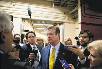  ?? Sam Hodgson / New York Times 2016 ?? Paul Manafort talks to reporters at the GOP convention in Cleveland last year. Manafort, then Donald Trump’s campaign manager, is under scrutiny for his business and political dealings.