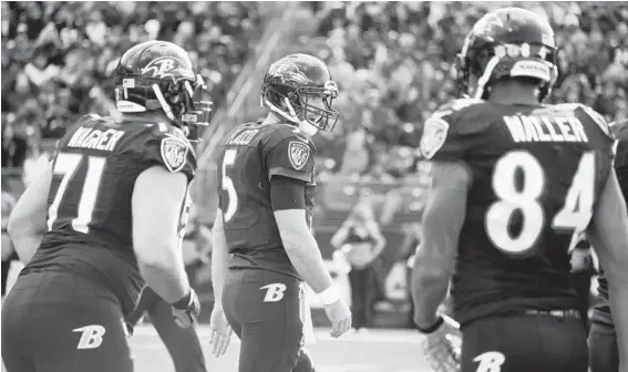  ?? KARL MERTON FERRON/BALTIMORE SUN ?? “I think it plays well to what we do,” Ravens quarterbac­k Joe Flacco said of the no-huddle offense. But, he added, “I don’t think you want to do it 100 percent of the time.”