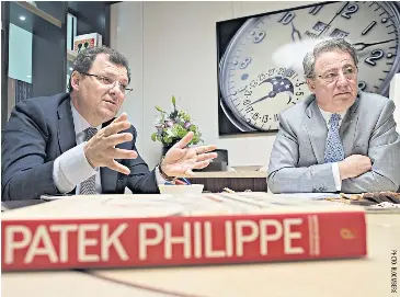  ??  ?? Thierry Stern, chairman of Patek Philippe, left, gestures as he speaks while CEO Claude Peny listens during an interview at the company’s booth at the 2017 Baselworld luxury watch and jewellery fair on Thursday.