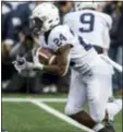  ?? TONY DING — ASSOCIATED PRESS ?? Penn State’s Miles Sanders (24) rushes against Michigan in Ann Arbor, Mich.