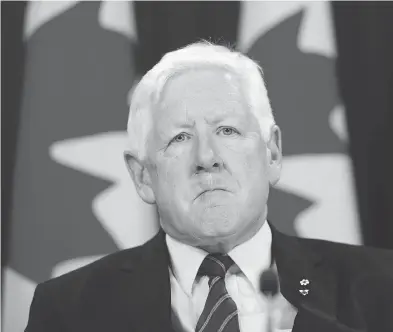  ?? SEAN KILPATRICK / THE CANADIAN PRESS ?? Canadian special envoy Bob Rae releases a report Tuesday on the humanitari­an and security crisis in Myanmar.