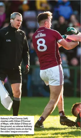  ??  ?? Galway’s Paul Conroy (left) clashes with Cillian O’Connor of Mayo, with Aidan O’Shea on the ground, as referee Anthony Nolan (centre) looks on during the sides’ league encounter