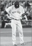  ?? FRANK GUNN/THE CANADIAN PRESS VIA AP ?? Yankees starting pitcher Masahiro Tanaka reacts Friday after giving up a grand slam to Blue Jays shortstop Ryan Goins during the sixth inning in Toronto.