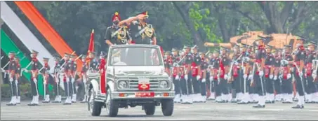  ?? PHOTO COURTESY: IMA ?? Lt Gen RP Singh, Western Army Commander, takes the salute during the passing-out parade at the Indian Military Academy in Dehradun on Saturday.