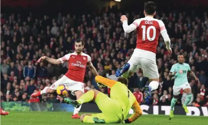  ??  ?? Henrikh Mkhitaryan scores Arsenal’s second goal against Bournemout­h after an assist from Mesut Özil. Photograph: Stuart MacFarlane/ Arsenal FC via Getty Images