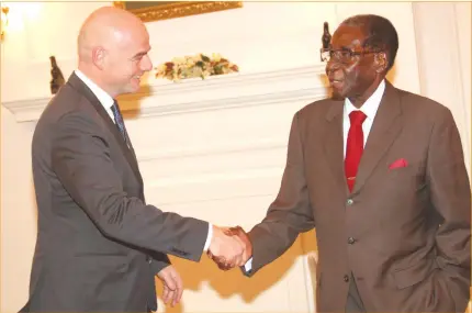  ??  ?? President Mugabe welcomes Fifa president Gianni Infantino at State House yesterday. (See Comment on Page 4 & stories on Page 14)Picture by John Manzongo