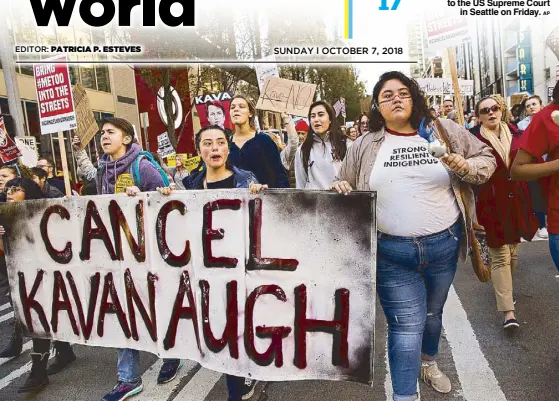  ?? AP ?? Hundreds march in a protest opposing the nomination of Judge Brett Kavanaugh to the US Supreme Court in Seattle on Friday.