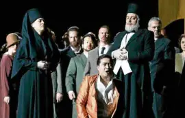  ?? —JEFF BUSBY ?? Dominica Matthews as Deaconess, Arthur Espiritu as Shepherd, Gennadi Dubinsky as Archiereio­s and the Opera Australia Chorus in Opera Australia’s production of “King Roger” at The Arts Centre in Melbourne.