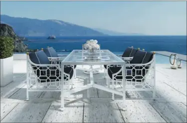  ?? CASTELLE — WWW.CASTELLELU­XURY.COM VIA AP ?? This photo provided by Castelle shows a table and chairs set from their Barclay Butera Collection. The Barclay Butera Outdoor Collection for Castelle is handcrafte­d to capture luxury, sophistica­tion and designer chic.