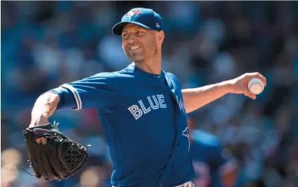  ?? CP PHOTO ?? Toronto Blue Jays starting pitcher J.A. Happ pitches against the New York Yankees in Toronto on Saturday.