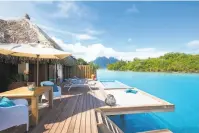  ?? Conrad Bora Bora Nui photos ?? Left: The decks of the resort’s overwater bungalows feature catamaran nets for lounging.