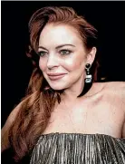  ??  ?? Lindsay Lohan is determined to forget the past – or at least move on from it.