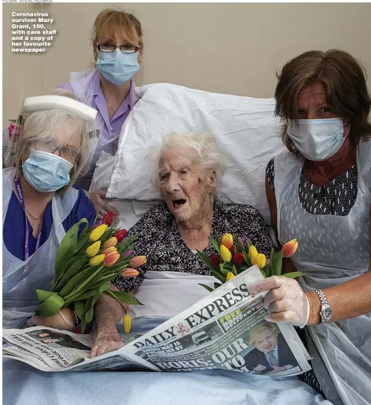  ?? Picture: STEVE REIGATE ?? Coronaviru­s survivor Mary Grant, 100, with care staff and a copy of her favourite newspaper