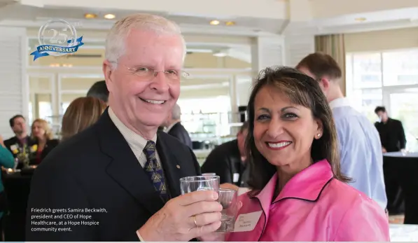  ??  ?? Friedrich greets Samira Beckwith, president and CEO of Hope Healthcare, at a Hope Hospice community event.