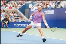  ??  ?? Rafael Nadal, of Spain, returns a shot to Hyeon Chung, of South Korea, during round three of the US Open tennis championsh­ips on Aug 31, 2019
in New York. (AP)