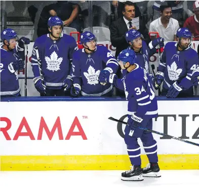  ?? JON BLACKER / THE CANADIAN PRESS ?? Maple Leafs’ Auston Matthews celebrates a goal during pre-season game. The success of the American-born player could be one reason why Quebec City won’t be getting an NHL team anytime soon, writes Postmedia’s Lance Hornby.