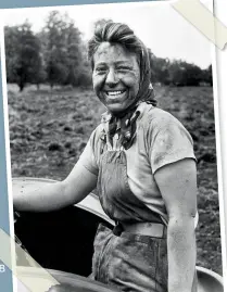  ??  ?? BELOW A woman at work cultivatin­g rich black farmland soil in the English countrysid­e. July 28, 1942