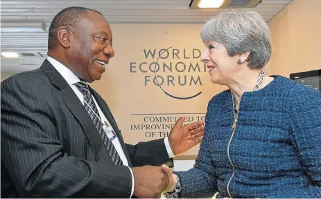  ?? /Elmond Jiyane ?? Greetings: Cyril Ramaphosa, then the deputy president, meets British Prime Minister Theresa May on the margins of the World Economic Forum annual meeting in Davos, Switzerlan­d, in January.