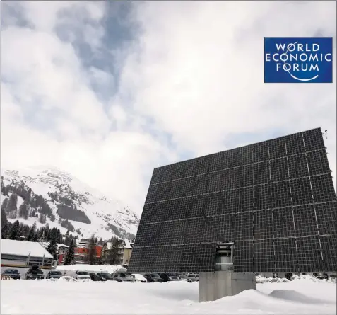  ?? Bloomberg ?? A GIANT solar panel can be seen at the World Economic Forum registrati­on area in Davos, Switzerlan­d. World leaders, influentia­l executives, bankers and policymake­rs will attend the 50th annual meeting of the WEF from today until Friday. I SIMON DAWSON