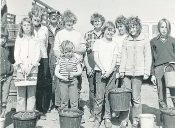  ??  ?? These berry pickers were busy at the raspberry crop at Smedley’s, Balgillo Estates, Broughty Ferry. The photograph is dated July 1972.